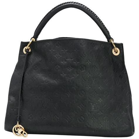 louis vuitton black embossed handbag.